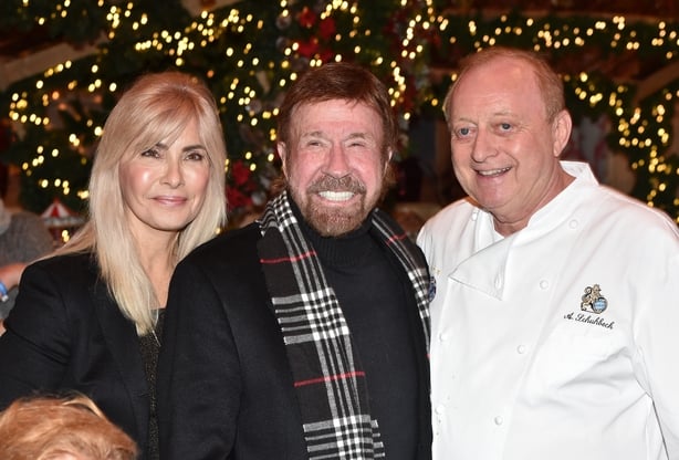 HENNDORF AM WALLERSEE, AUSTRIA - NOVEMBER 12: Actor Chuck Norris and wife Gena O'Kelley (L) and Alfons Schuhbeck during the Gut Aiderbichl Christmas Market opening on November 12, 2019 in Henndorf am Wallersee, Austria. (Photo by Hannes Magerstaedt/Getty Images)
