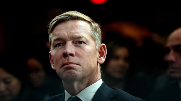 WASHINGTON, DC - NOVEMBER 17: McDonald's President and CEO Chris Kempczinski listens as U.S. President Donald Trump delivers remarks at the McDonald's Impact Summit at the Westin DC Downtown on November 17, 2025 in Washington, DC. Trump spoke on the economy and highlighted his One Big Beautiful Bill