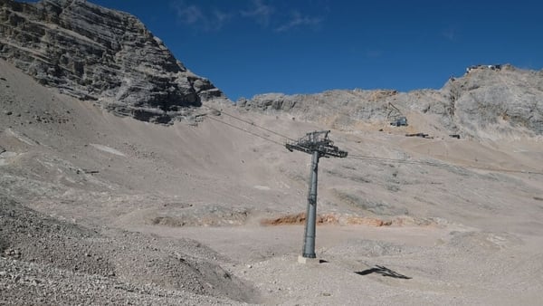 A ski lift stands near barely visible remains of the Southern Schneeferner glacier