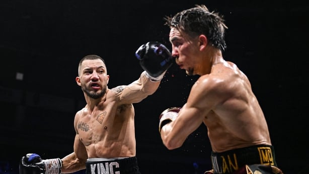 Kevin Walsh lands a punch on Michael Conlan at the SSE Arena in Belfast