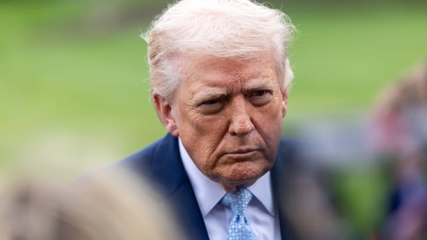 US President Donald Trump speaks to members of the media