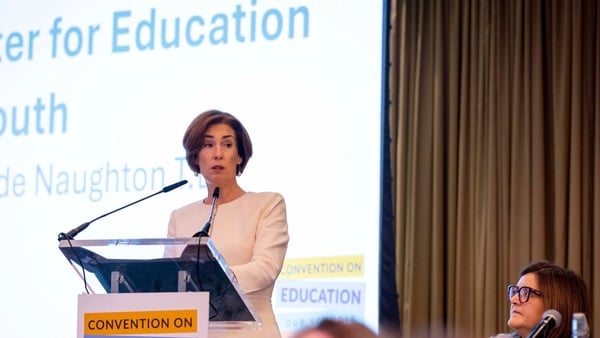 Hildegarde Naughton address the convention on education