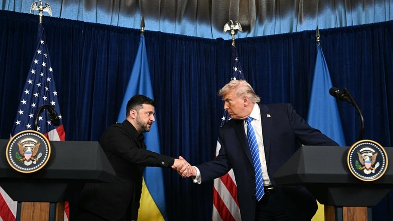 US President Donald Trump and Ukranian President Volodymyr Zelensky shake hands during a press conference following talks at Trump's Mar-a-Lago residence in Palm Beach, Florida