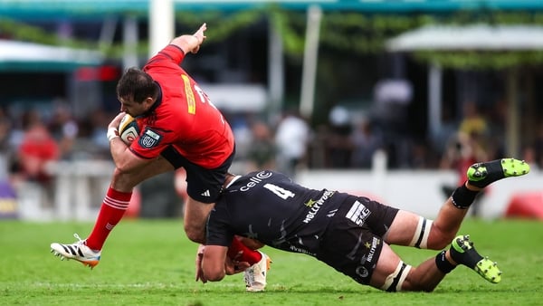 21 March 2026; Diarmuid Barron of Munster is tackled by Jason Jenkins of Hollywoodbets Sharks during the United Rugby Championship match between Hollywoodbets Sharks and Munster at Hollywoodbets Kings Park Stadium in Durban, South Africa. Photo by Shaun R