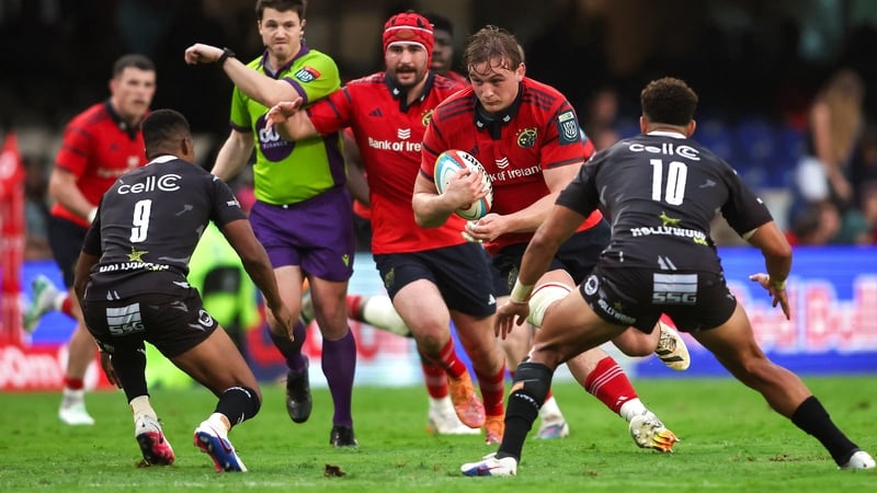 21 March 2026; Gavin Coombes of Munster in action against Grant Williams, 9, and Jordan Hendrikse, 10, of Hollywoodbets Sharks during the United Rugby Championship match between Hollywoodbets Sharks and Munster at Hollywoodbets Kings Park Stadium in Durba