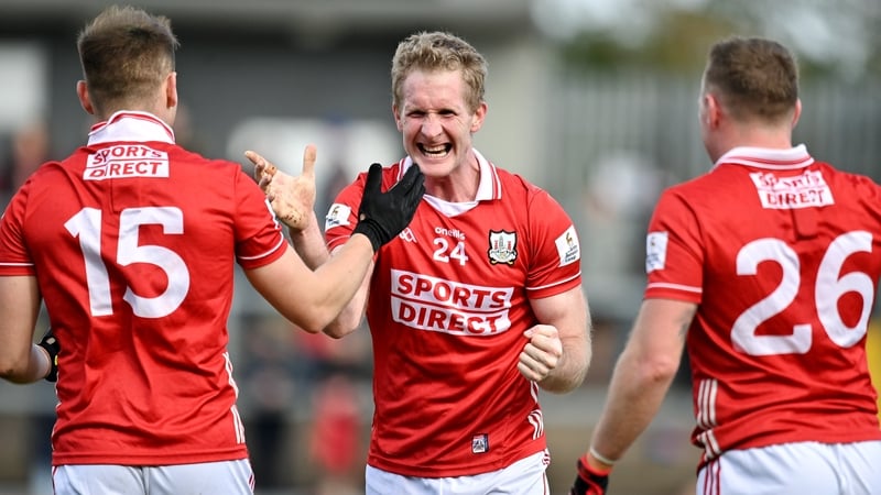 22 March 2026; Ruairi Deane of Cork celebrates with Steven Sherlock and Brian Hurley of Cork after the Allianz Football League Division 2 match between Tyrone and Cork at O'Neills Healy Park in Omagh, Tyrone. Photo by Oliver McVeigh/Sportsfile
