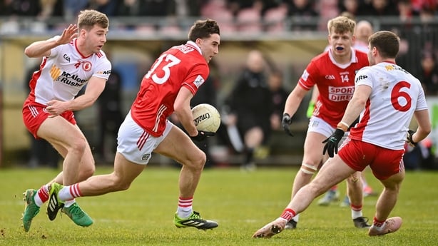 Chris Og Jones of Cork in action against Cormac Quinn and Niall Devlin of Tyrone during the Allianz Football League Division 2 match between Tyrone and Cork at O'Neills Healy Park in Omagh, Tyrone. Photo by Oliver McVeigh/Sportsfile