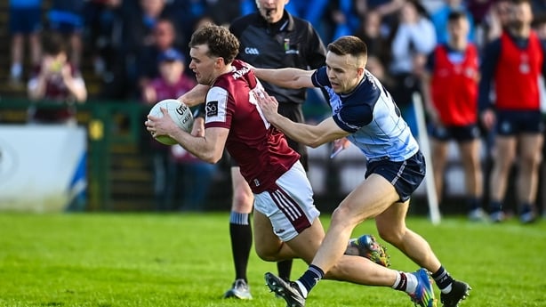 22 March 2026; Robert Finnerty of Galway is tackled by Eoin Murchan of Dublin after Finnerty's penalty was saved, but a second penalty wasn't awarded, during the Allianz Football League Division 1 match between Galway and Dublin at Pearse Stadium in Galway. Photo by Piaras Ó Mídheach/Sportsfile