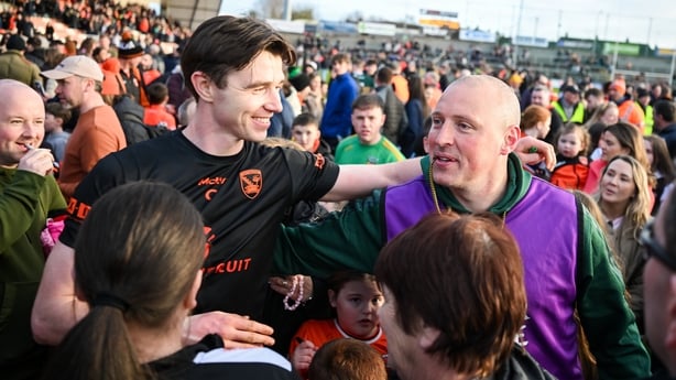 22 March 2026; Ben Crealey of Armagh with Kerry selector and coach Kieran Donaghy after the Allianz Football League Division 1 match between Armagh and Kerry at BOX-IT Athletic Grounds in Armagh. Photo by Ray McManus/Sportsfile