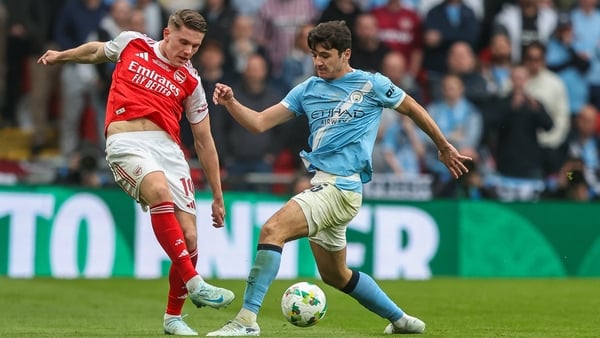 Viktor Gyokeres of Arsenal runs with the ball while being marked by Abdukodir Khusanov of Manchester City during the Carabao Cup Final match between Arsenal and Manchester City at Emirates Stadium in London, United Kingdom, on March 22, 2026. (Photo by Al