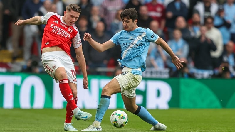 Viktor Gyokeres of Arsenal runs with the ball while being marked by Abdukodir Khusanov of Manchester City during the Carabao Cup Final match between Arsenal and Manchester City at Emirates Stadium in London, United Kingdom, on March 22, 2026. (Photo by Al