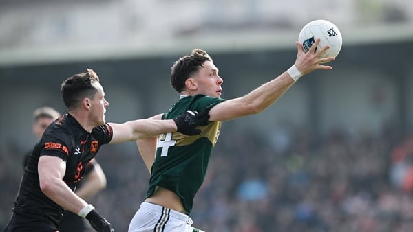 22 March 2026; David Clifford of Kerry is tackled by Aaron McKay of Armagh during the Allianz Football League Division 1 match between Armagh and Kerry at BOX-IT Athletic Grounds in Armagh. Photo by Ray McManus/Sportsfile