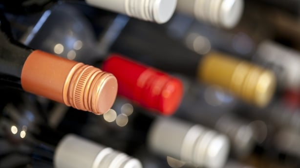 Close-up of the wine bottles stored in a wine rack.