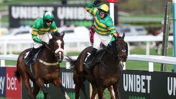 CHELTENHAM, ENGLAND - MARCH 10: R P McLernon riding Johnnywho celebrates winning the Trustmarque Ultima Handicap Chase from Jagwar ridden by Mark Walsh at Cheltenham Racecourse on March 10, 2026 in Cheltenham, England. (Photo by Michael Steele/Getty Image
