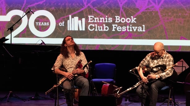 uileann pipers Blackie O'Connell and Mickey Dunne, performing for Sunday Miscellany live event at Ennis Book Club Festival, March 2026