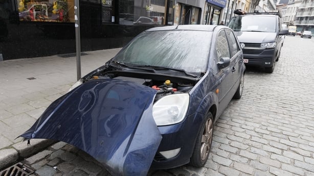 The aftermath of a parked car which was set on fire last night in the Jewish quarter of Antwerp