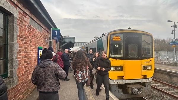 Commuters boarding the train for Cork at Midleton station