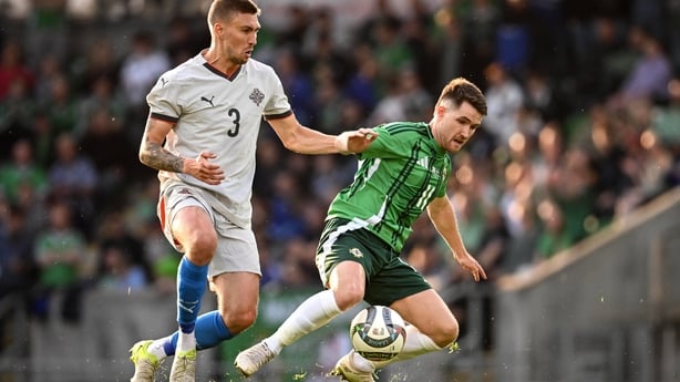 10 June 2025; Paul Smyth of Northern Ireland in action against Daníel Leó Grétarsson of Iceland during the International Friendly match between Northern Ireland and Iceland at Clearer Twist National Football Stadium at Windsor Park in Belfast. Photo by Ramsey Cardy/Sportsfile