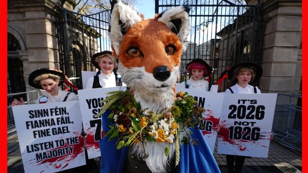 Protesters from Rural Ireland Against Fox Hunting take part in a demonstration outside Leinster House in Dublin calling on the Government for a complete ban on hunting foxes with hounds