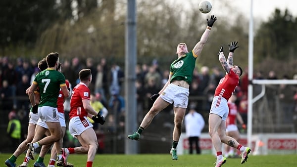 Jack Flynn of Meath in action against Seán Walsh of Cork during the Allianz Football League Division 2 clash in February 2026