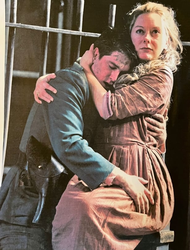 Archive image of Cathy Belton playing a character on stage