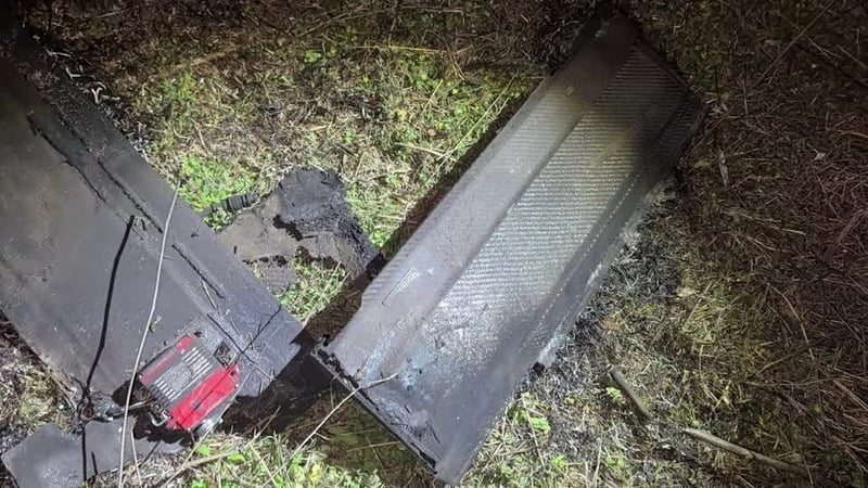 This screengrab from a video shows the fragment of a military drone which crashed