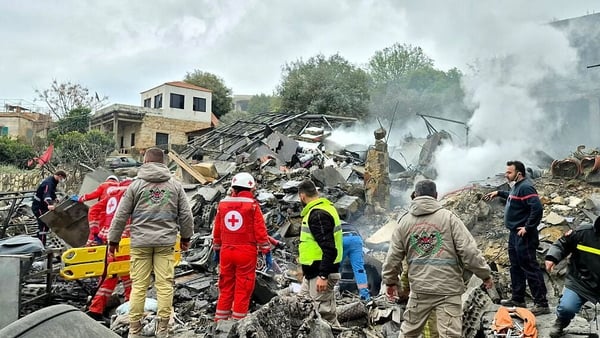 First responders on site after an Israeli airstrike that targeted a southern Lebanese village