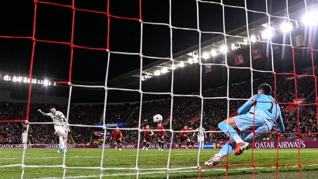 Troy Parrott of Republic of Ireland shoots to score his side's first goal, a penalty, during the FIFA World Cup 2026 European Qualifiers play-off semi-final match between Czechia and Republic of Ireland at Fortuna Arena in Prague, Czechia.