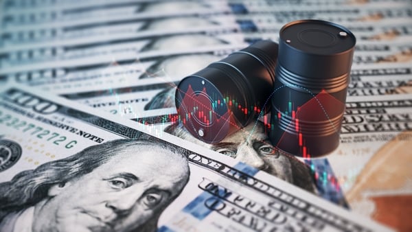 3d render Black Oil Barrels and Financial Charts on Stack of $100 Bills, Oil and Finance Concept (Depth Of Field)