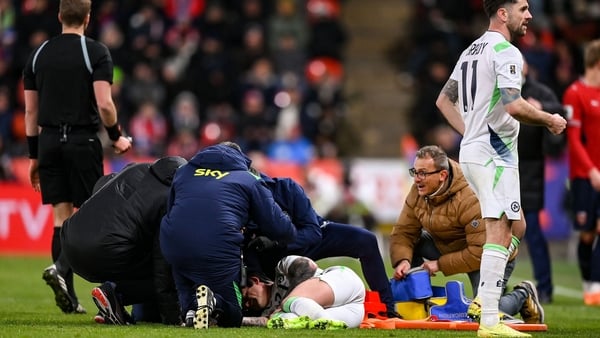 26 March 2026; Sammie Szmodics of Republic of Ireland receives medical attention during the FIFA World Cup 2026 European Qualifiers play-off semi-final match between Czechia and Republic of Ireland at Fortuna Arena in Prague, Czechia. Photo by Stephen McC
