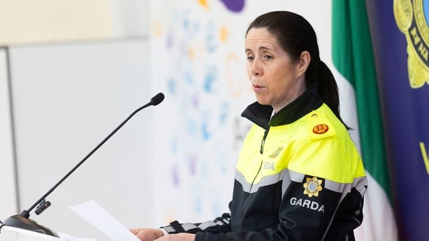 Photo shows Assistant Commissioner Catharina Gunne speaking into a microphone