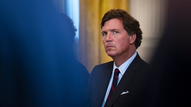 Tucker Carlson, former FOX News host and current host of The Tucker Carlson Show, attends a meeting with oil executives in the East Room of the White House in January