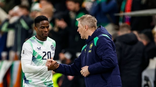 Chiedozie Ogbene of Republic of Ireland and Republic of Ireland head coach Heimir Hallgrimsson during the FIFA World Cup 2026 European Qualifiers play-off semi-final match between Czechia and Republic of Ireland at Fortuna Arena in Prague, Czechia.
