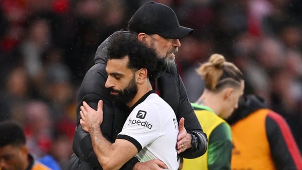 Jurgen Klopp, Manager of Liverpool, embraces Mohamed Salah of Liverpool as he leaves the field after being substituted during the Emirates FA Cup Quarter Final between Manchester United and Liverpool FC at Old Trafford on March 17, 2024 in Manchester, Eng
