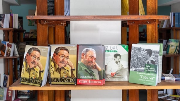 Santa Clara, Villa Clara, Cuba-March 20, 2019: A bookstore shelf showcasing books about Fidel Castro, Raul Castro, and the Cuban Revolution. The scene is taken on the 'Pepe Medina' bookstore located in the Leoncio Vidal Park which is a National Monument area and a tourist attraction. There are no pe