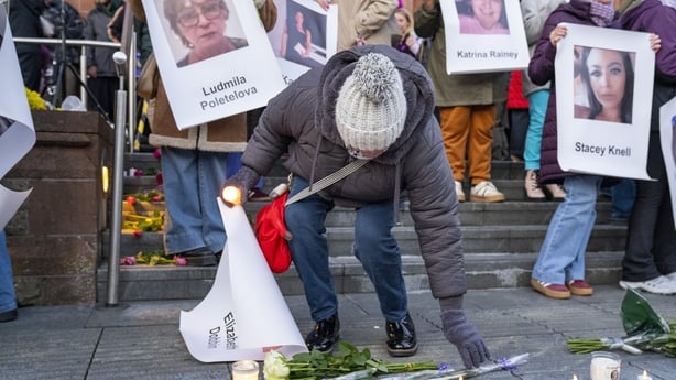 People attend a vigil for Amy Doherty at the Guildhall 