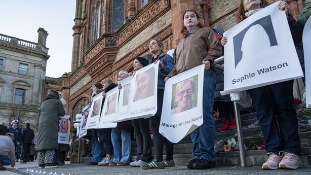 People attend a vigil for Amy Doherty at the Guildhall 