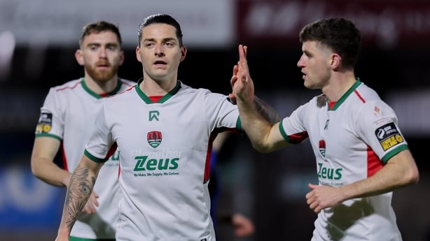 27 March 2026; Ruairí Keating of Cork City centre, celebrates with teammates Conor Drinan and Darragh Crowley their sides first goal scored by Hans Mpongo, not pitcured, during the SSE Airtricity Men's First Division match between Cork City and Athlone Town at Turner's Cross in Cork. Photo by Michae