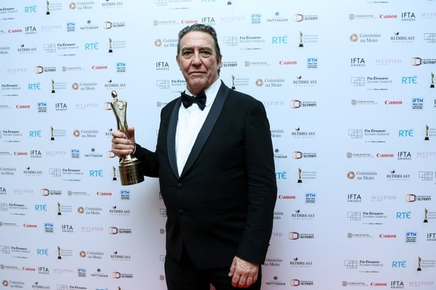 DUBLIN, IRELAND - FEBRUARY 20: Ciarán Hinds receives the Academy's Lifetime Achievement Award at the 2026 Irish Film & Television (IFTA) Awards for Film & Drama at Dublin Royal Convention Centre in Dublin on February 20, 2026 in Dublin, Ireland. (Photo by Charles McQuillan/Getty Images)