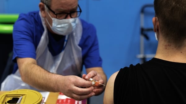CANTERBURY, ENGLAND - MARCH 19: A student receives the Meningitis B vaccine at the University of Kent sports hall on March 19, 2026 in Canterbury, England. A deadly meningitis outbreak at the University of Kent In Canterbury is being treated as a "nationa
