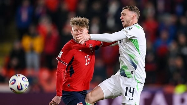 Jack Taylor of Republic of Ireland in action against Pavel Šulc of Czechia during the FIFA World Cup 2026 European Qualifiers play-off semi-final match between Czechia and Republic of Ireland at Fortuna Arena in Prague, Czechia.