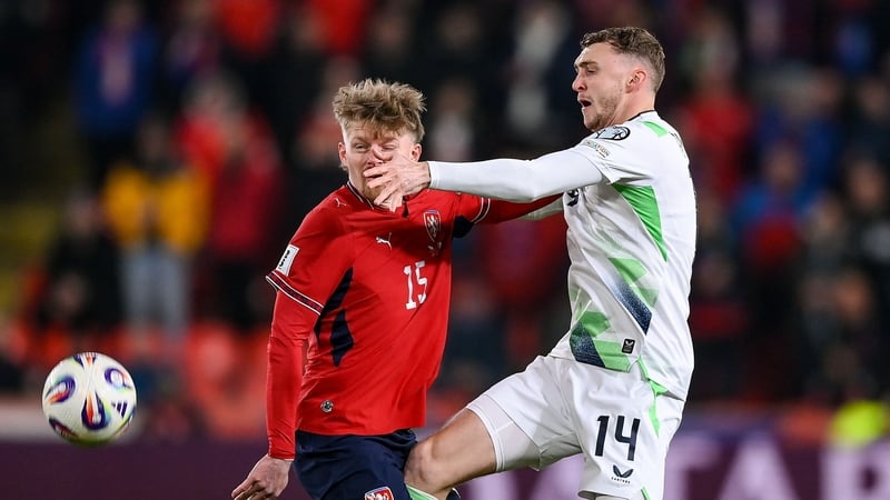 Jack Taylor of Republic of Ireland in action against Pavel Šulc of Czechia during the FIFA World Cup 2026 European Qualifiers play-off semi-final match between Czechia and Republic of Ireland at Fortuna Arena in Prague, Czechia.