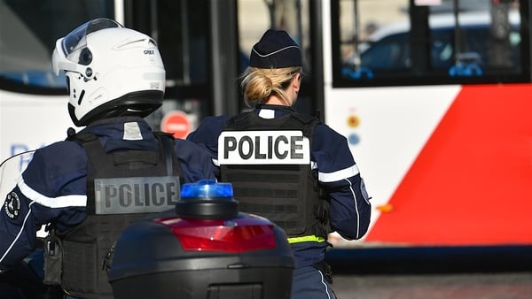 Paris, France-September 19 2025: Two police officer regulating traffic in a Parisian square, France.