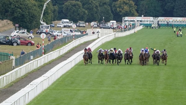 DONCASTER, ENGLAND - SEPTEMBER 10: A general view as runners 
 make their way down the track in The Coopers Marquees Maiden Stakes at Doncaster Racecourse on September 10, 2021 in Doncaster, England. (Photo by Alan Crowhurst/Getty Images)