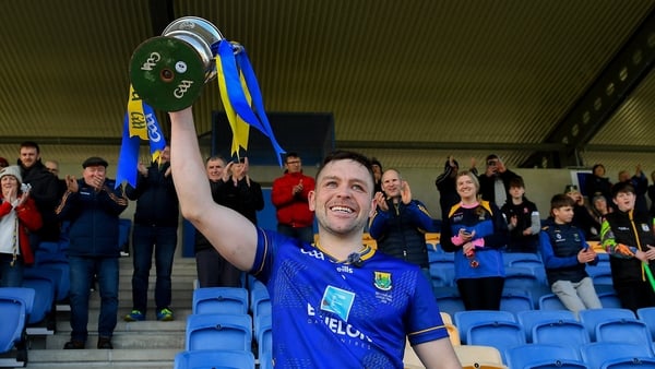 28 March 2026; Padraig Doran captain of Wicklow lifts the cup after the Allianz Hurling League Division 3 final match between Wicklow and Donegal at Echelon Park in Aughrim, Wicklow. Photo by Matt Browne/Sportsfile