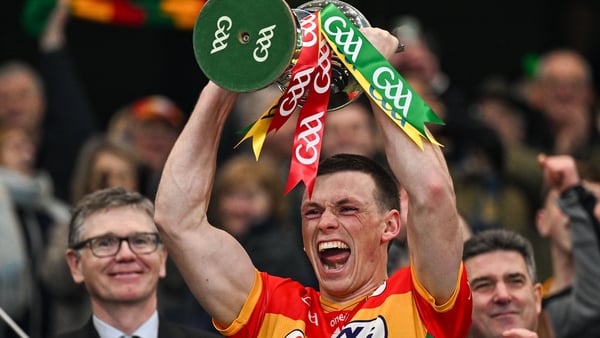 Carlow captain Mikey Bambrick lifts the cup after victory in the Division 4 final