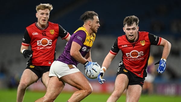 28 March 2026; Dylan Furlong of Wexford in action against Callum Rogers, right, and Adam Crimmins of Down during the Allianz Football League Division 3 final match between Down and Wexford at Croke Park in Dublin. Photo by David Fitzgerald/Sportsfile