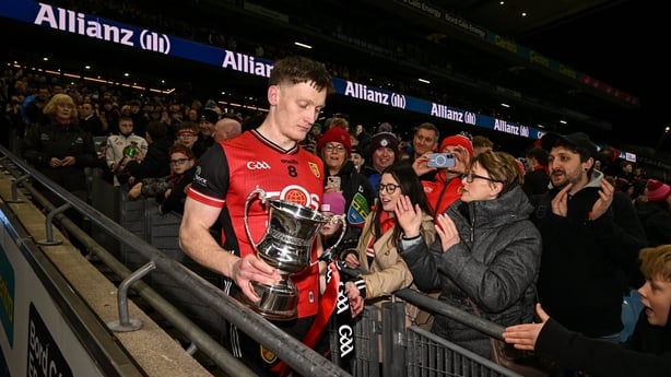 28 March 2026; Down captain Odhran Murdock walks down the Hogan stand stairs with the cup after the Allianz Football League Division 3 final match between Down and Wexford at Croke Park in Dublin. Photo by David Fitzgerald/Sportsfile