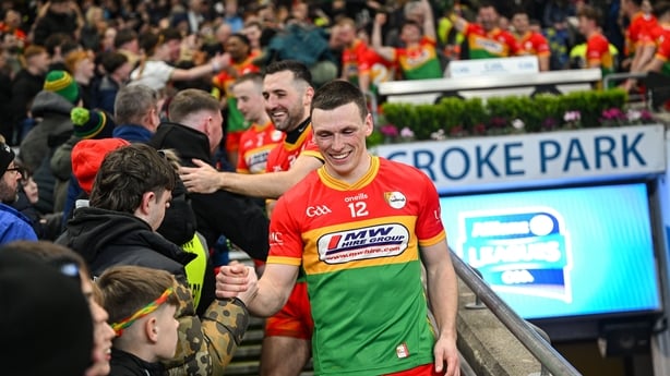 28 March 2026; Mikey Bambrick of Carlow is congratulated by supporters after the Allianz Football League Division 4 final match between Carlow and Longford at Croke Park in Dublin. Photo by David Fitzgerald/Sportsfile