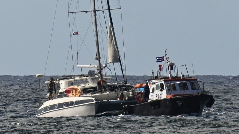 This view shows one of the two sailboats (L) carrying humanitarian aid that had previously gone missing arriving at the port of Havana on March 28, 2026. Two sailboats carrying humanitarian aid to crisis-hit Cuba reached Havana on Saturday after a long jo